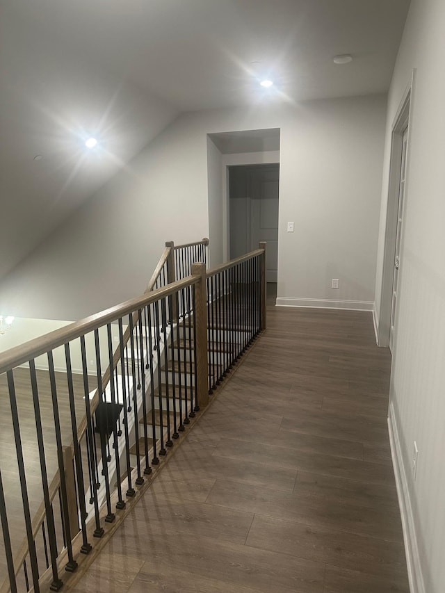 corridor featuring dark hardwood / wood-style floors