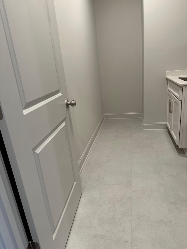 bathroom featuring vanity and tile patterned flooring