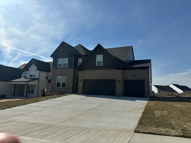 view of front facade featuring a garage and a front lawn