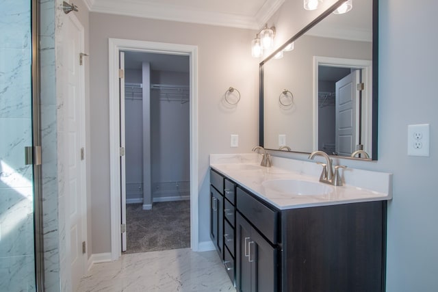 bathroom with crown molding and vanity