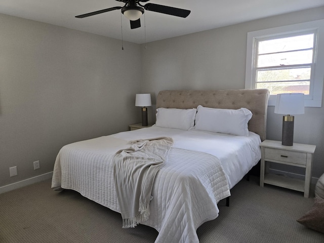 bedroom with carpet, baseboards, and ceiling fan