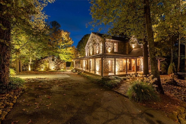 view of property exterior at twilight