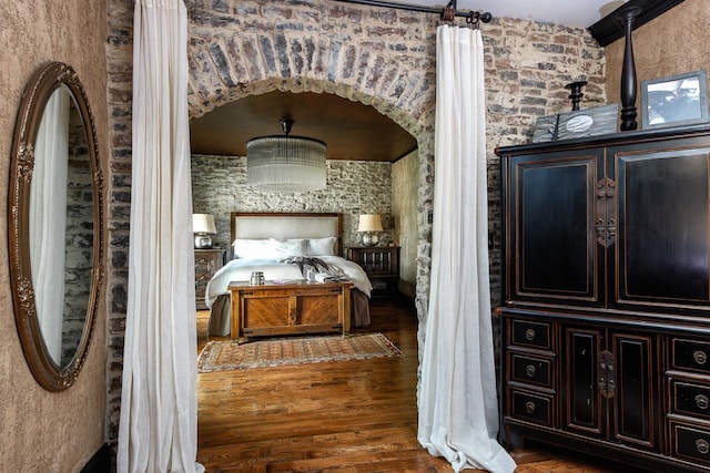 bedroom featuring dark hardwood / wood-style floors