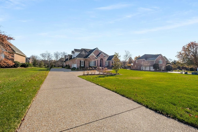 view of front of property with a residential view, concrete driveway, and a front lawn