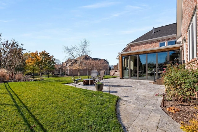 view of yard with fence and a patio area