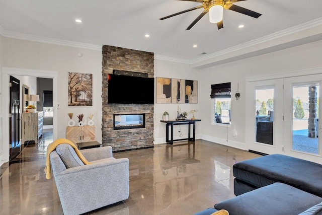 living room featuring ceiling fan, ornamental molding, and a stone fireplace