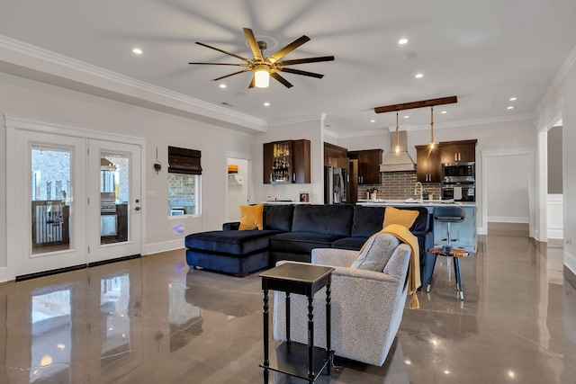 living room featuring crown molding