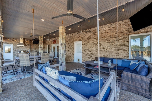 view of patio with ceiling fan and an outdoor hangout area