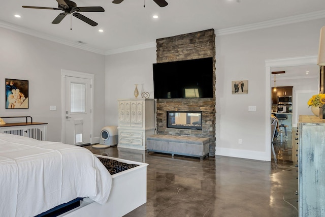 bedroom with ceiling fan, ornamental molding, and a fireplace