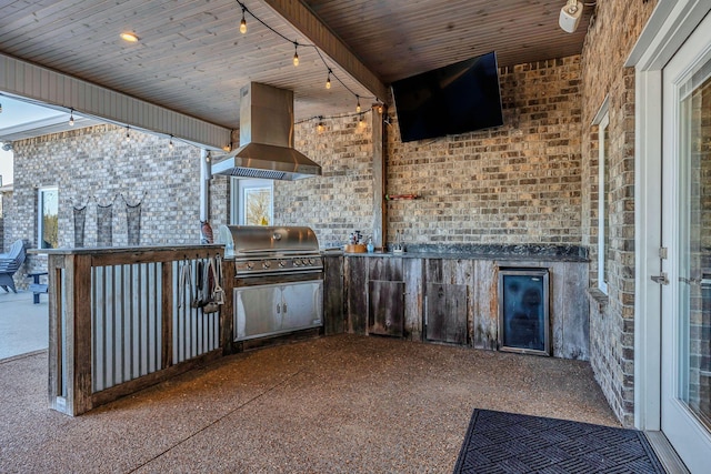 view of patio / terrace featuring an outdoor kitchen and grilling area