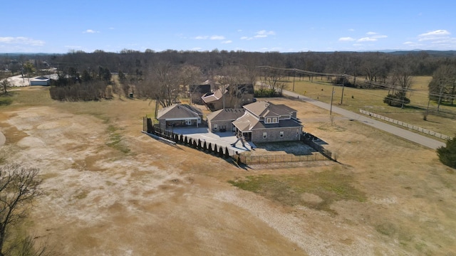 birds eye view of property featuring a rural view