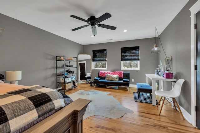 bedroom featuring hardwood / wood-style flooring and ceiling fan