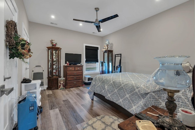 bedroom featuring ceiling fan and light wood-type flooring