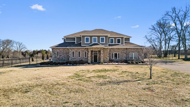 view of front of home featuring a front yard