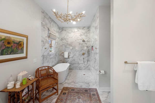 bathroom with an inviting chandelier and independent shower and bath