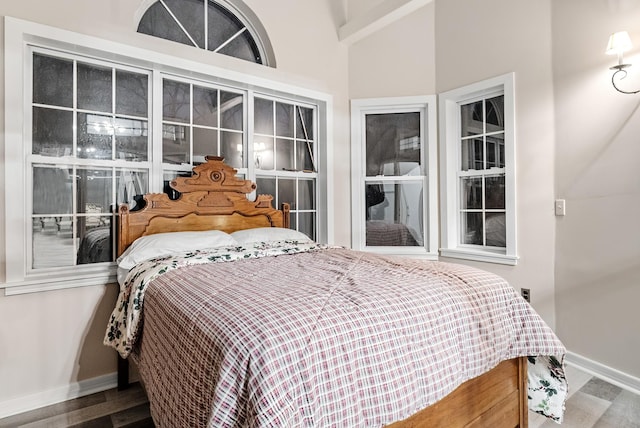 bedroom with wood-type flooring