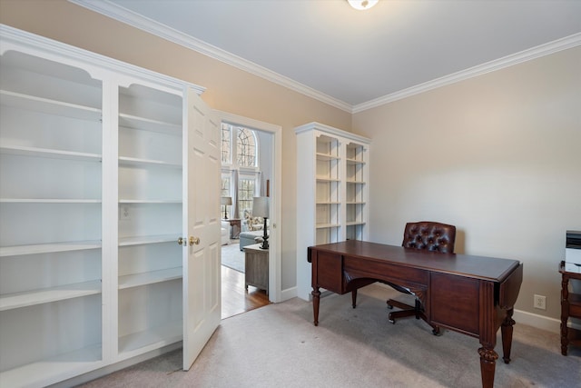 carpeted office featuring crown molding