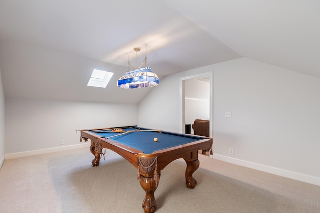 rec room featuring light colored carpet, lofted ceiling with skylight, and pool table