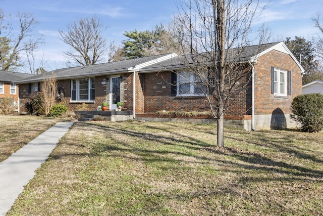 single story home with a front yard