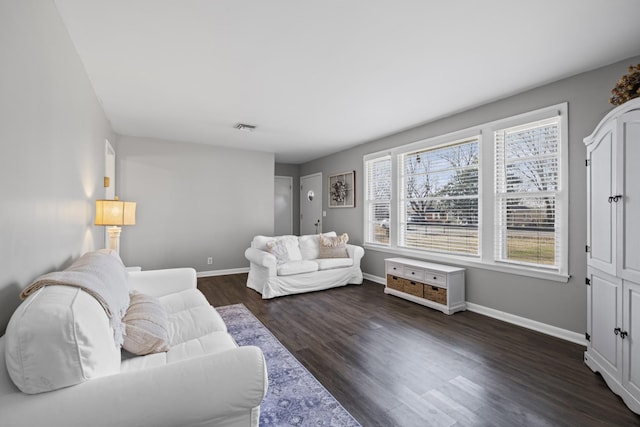 living room featuring dark hardwood / wood-style flooring