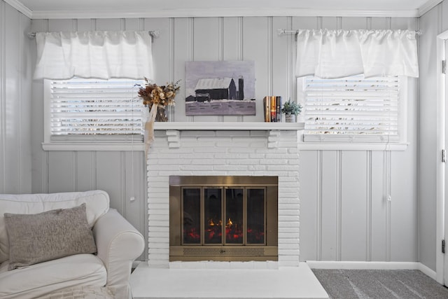 living room featuring a brick fireplace and carpet floors