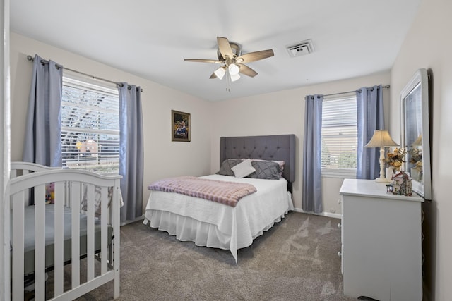 carpeted bedroom featuring ceiling fan