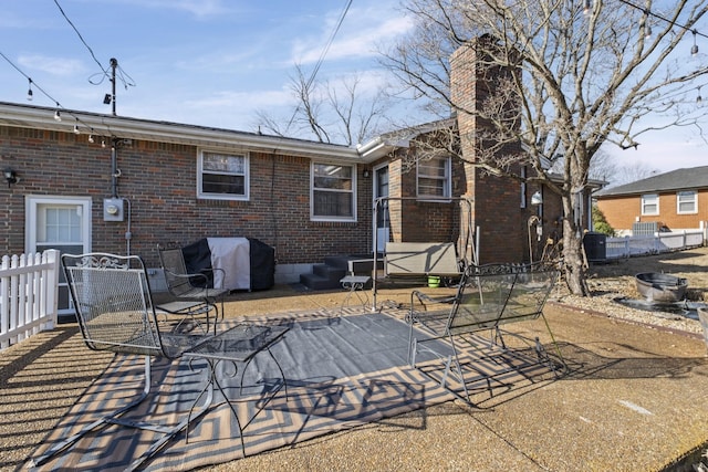 back of house with a patio area