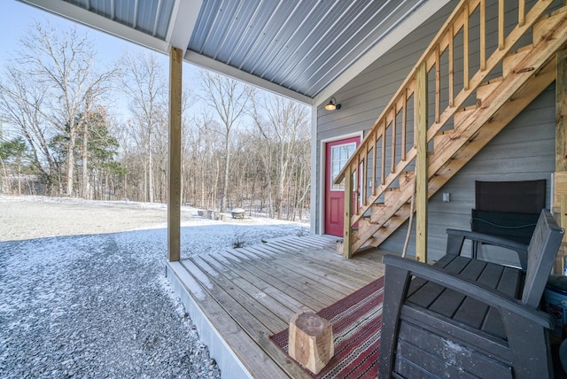 view of snow covered deck