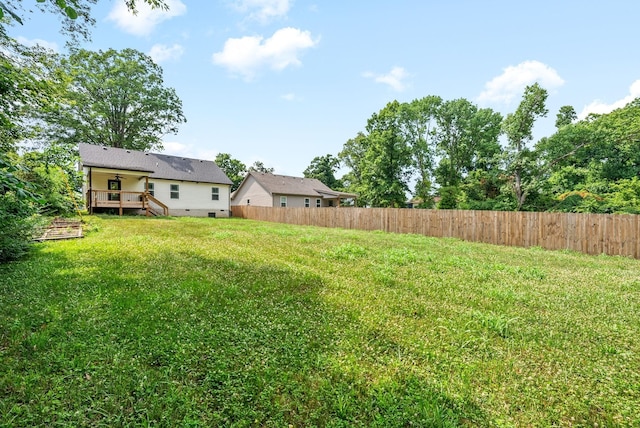 view of yard with a deck