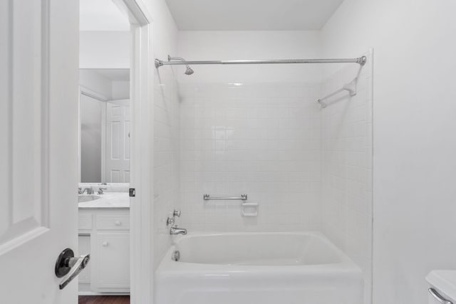 full bathroom featuring vanity, toilet, and  shower combination