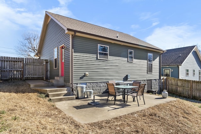 back of property featuring a patio area