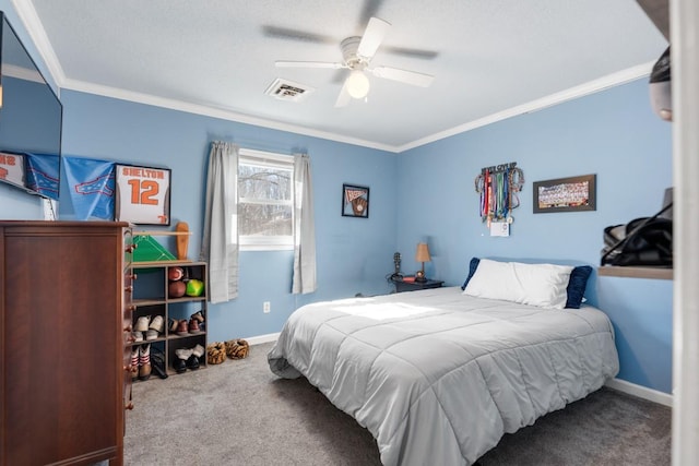 carpeted bedroom featuring crown molding and ceiling fan