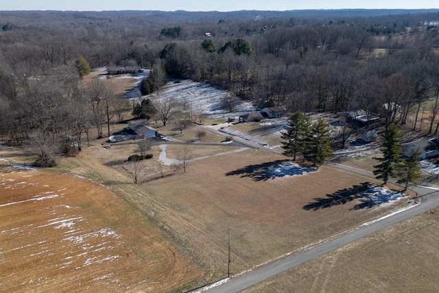 birds eye view of property featuring a rural view