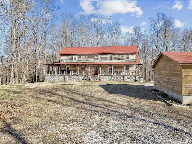 back of property featuring a porch