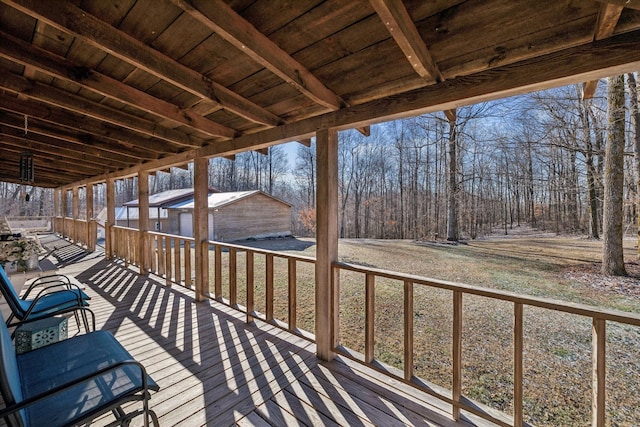 wooden deck featuring an outdoor structure