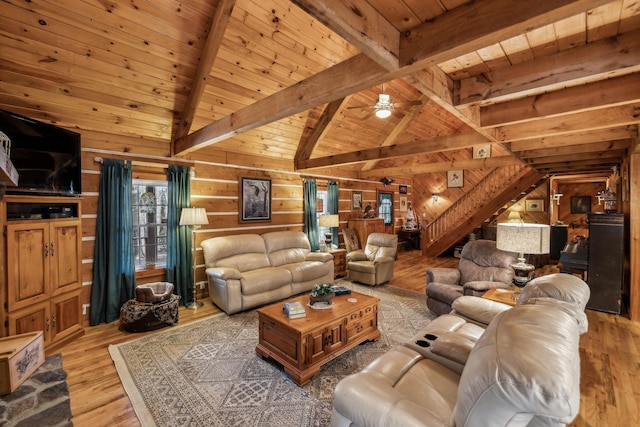 living room with wooden ceiling and wooden walls