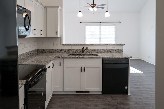 kitchen featuring white cabinetry, dark hardwood / wood-style flooring, sink, and black appliances