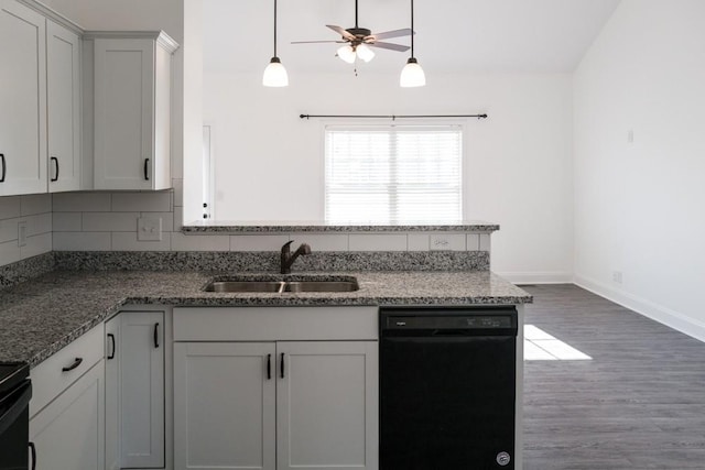 kitchen with black dishwasher, sink, decorative backsplash, and white cabinets