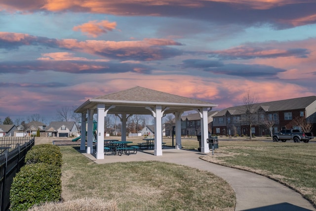 view of home's community with a yard and a gazebo