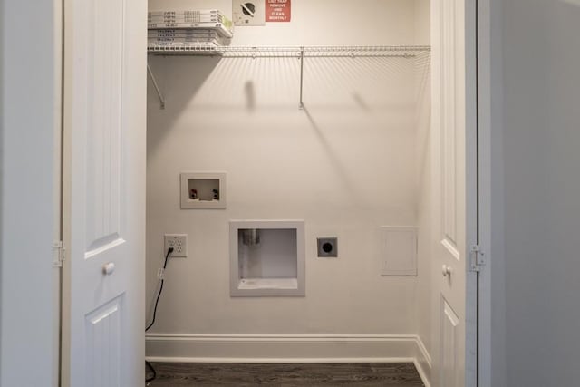 clothes washing area with hookup for a washing machine, electric dryer hookup, and dark hardwood / wood-style flooring