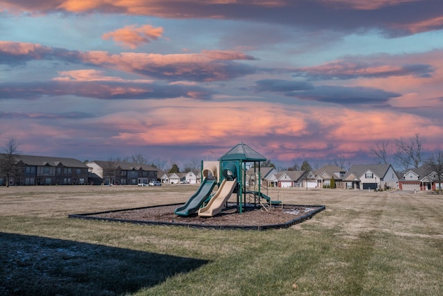 playground at dusk with a yard