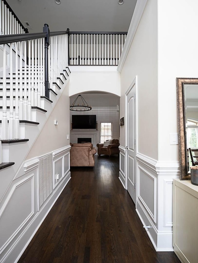 stairway featuring wood-type flooring