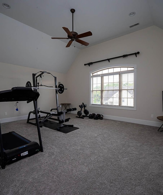 workout area with ceiling fan, vaulted ceiling, and carpet