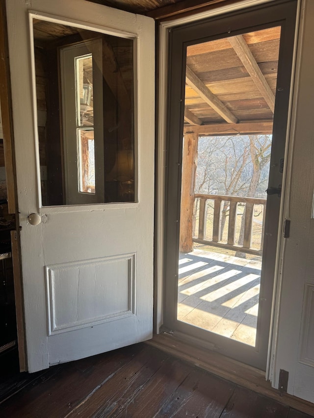 doorway to outside with dark hardwood / wood-style flooring