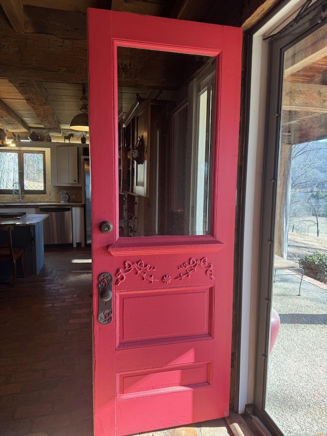 doorway to property featuring sink