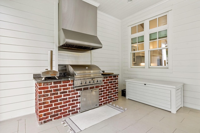 view of patio featuring grilling area and exterior kitchen