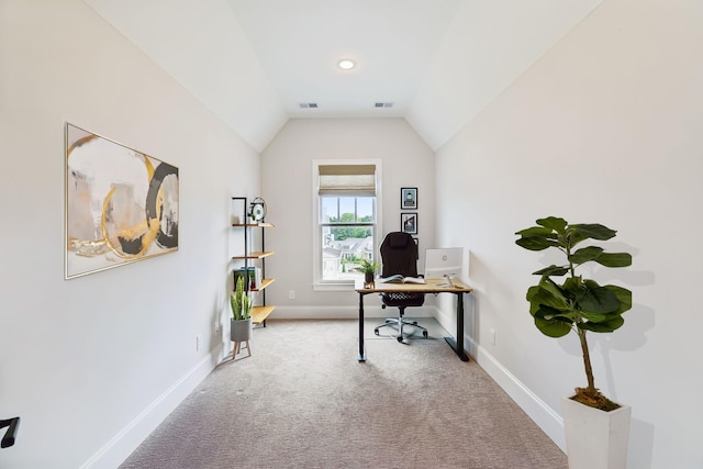 office area featuring carpet flooring and vaulted ceiling