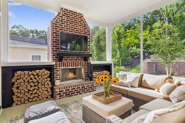 view of patio / terrace featuring an outdoor living space with a fireplace