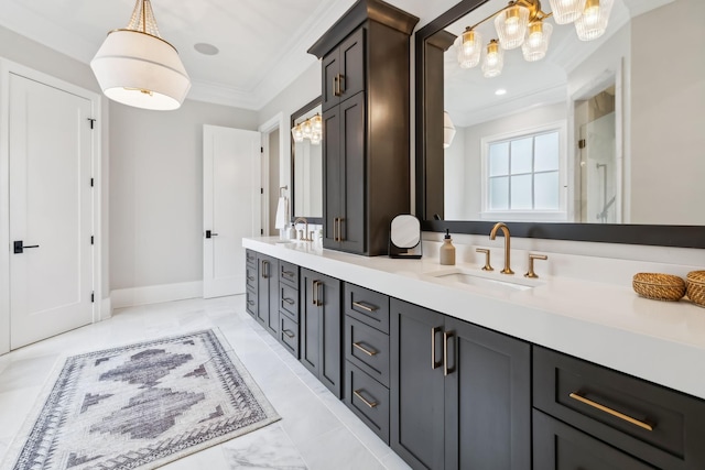 bathroom with ornamental molding and vanity