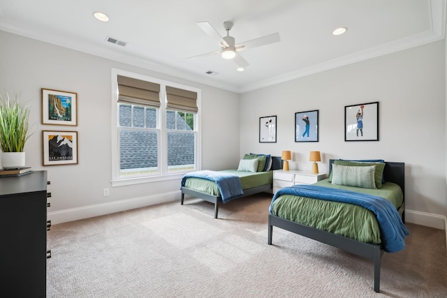 bedroom with ceiling fan, ornamental molding, and light colored carpet